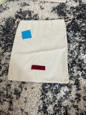 Valentino Cream Drawstring Dust Bag with Red Logo Patch